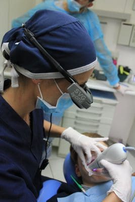 Dentist Treating Patient